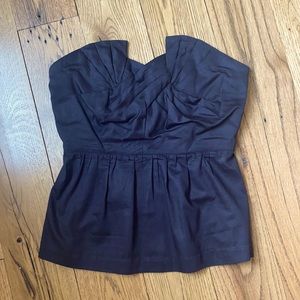 Strapless black top w/ zip closure in back